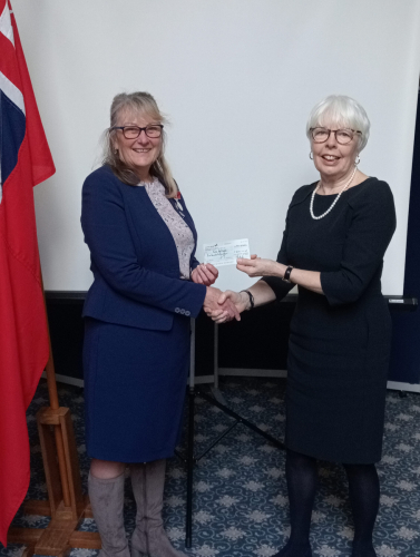 Georgie Hibberd presenting cheque to Margaret Beecham from TS Royal George of Ryde Sea Cadets AGM-2023-2