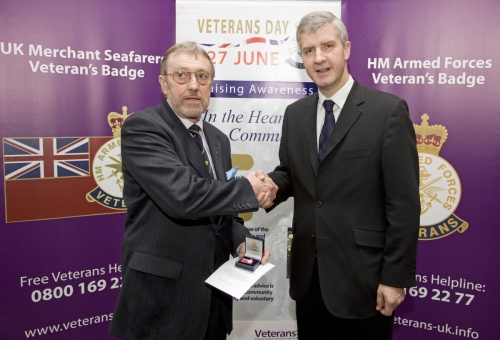 Ted Sandle receiving Merchant Navy Veteran's Badge from the Minister at the Imperial War Museum, January 2008